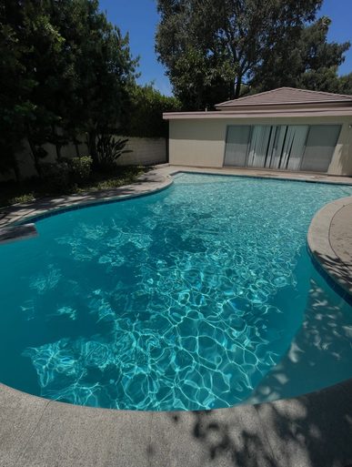 Clean residential pool serviced in Vero Beach, FL